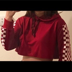 Red hooded top w/ checkered sleeves